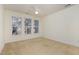 Bedroom with three windows and ceiling fan at 617 Eyam Hall Ln, Apex, NC 27502