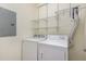 Convenient laundry room with washer, dryer, and shelving at 617 Eyam Hall Ln, Apex, NC 27502