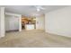 Spacious living room with carpet and ceiling fan at 617 Eyam Hall Ln, Apex, NC 27502