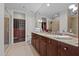 Bathroom with double sink vanity and large mirror, walk-in closet, and separate shower at 618 N Boylan Ave # 826, Raleigh, NC 27603