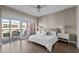 Comfortable bedroom with access to a private balcony and ample natural light at 618 N Boylan Ave # 826, Raleigh, NC 27603