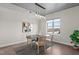 A modern dining room with a stylish oval table and artistic wall decor at 618 N Boylan Ave # 826, Raleigh, NC 27603