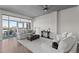 Sun-filled living room features large windows and comfortable seating at 618 N Boylan Ave # 826, Raleigh, NC 27603