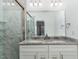 Elegant bathroom with double vanity and marble shower at 620 Rollins Mill Rd, Holly Springs, NC 27540