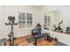 Home gym with exercise equipment and large mirror at 620 Rollins Mill Rd, Holly Springs, NC 27540