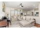 Bright and airy living room with comfortable seating at 620 Rollins Mill Rd, Holly Springs, NC 27540