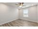 Bright bedroom with ceiling fan and wood-look flooring at 82 Gin Branch Rd, Wendell, NC 27591