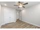 Bedroom with ceiling fan and double door closet at 82 Gin Branch Rd, Wendell, NC 27591