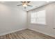Bright bedroom with hardwood floors and window blinds at 82 Gin Branch Rd, Wendell, NC 27591