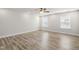 Bright bedroom with hardwood floors and neutral walls at 82 Gin Branch Rd, Wendell, NC 27591