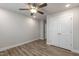 Bedroom with ceiling fan and double door closet at 82 Gin Branch Rd, Wendell, NC 27591