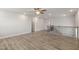 Spacious loft area with hardwood floors and ceiling fan at 82 Gin Branch Rd, Wendell, NC 27591