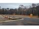 Residential empty lot at a street corner near trees, ready for a new build at 8721 Little Deer Ln, Raleigh, NC 27613