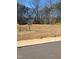 Beautiful wooded lot ready for a new build, presenting a serene, tree-lined backdrop for a future home at 8721 Little Deer Ln, Raleigh, NC 27613