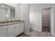 Bathroom with vanity, toilet, shower, and walk-in closet at 910 Rhino Bnd, Oxford, NC 27565