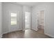 Entryway featuring a glass door, natural light, and doorways to other rooms at 910 Rhino Bnd, Oxford, NC 27565