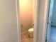 Half bathroom with tile floor and toilet at 9164 Dupree Meadow Dr # 14, Angier, NC 27501