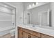 Bathroom featuring a single sink vanity with a large mirror and a tub-shower combo at 9164 Dupree Meadow Dr # 14, Angier, NC 27501