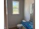 Bathroom featuring a toilet and window at 9164 Dupree Meadow Dr # 14, Angier, NC 27501