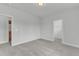 Bright bedroom featuring carpeted floors and an open doorway at 9164 Dupree Meadow Dr # 14, Angier, NC 27501