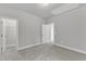 Bedroom featuring carpeted floors, neutral walls, and an open doorway to a walk-in closet at 9164 Dupree Meadow Dr # 14, Angier, NC 27501