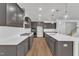 Spacious kitchen featuring a large island, stainless steel appliances, and abundant cabinet space at 9164 Dupree Meadow Dr # 14, Angier, NC 27501