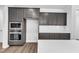 Kitchen with built in oven and microwave and light backsplash at 9164 Dupree Meadow Dr # 14, Angier, NC 27501