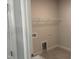 Laundry room with tiled floor and washer and dryer hookups at 9164 Dupree Meadow Dr # 14, Angier, NC 27501