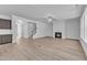 Expansive living room view with fireplace, open floorplan, and modern finishes at 9164 Dupree Meadow Dr # 14, Angier, NC 27501