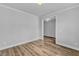 Bright room featuring hardwood floors, crown molding, and neutral colors at 9164 Dupree Meadow Dr # 14, Angier, NC 27501