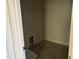 Small walk-in closet with wire shelving with tile floor and doorway entrance at 9164 Dupree Meadow Dr # 14, Angier, NC 27501