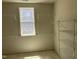 Spacious walk-in closet with wire shelving and a window providing natural light at 9164 Dupree Meadow Dr # 14, Angier, NC 27501