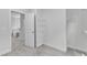 Spacious walk-in closet featuring an open doorway to the Primary bath and ample shelving at 9164 Dupree Meadow Dr # 14, Angier, NC 27501