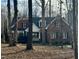 Two-story brick home on wooded lot at 109 Hope Ln, Archer Lodge, NC 27527