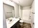 Bathroom featuring a shower-tub combo and single vanity sink at 111 Southern Estates Dr, Sanford, NC 27330