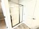 Modern bathroom with a tiled shower and glass door at 111 Southern Estates Dr, Sanford, NC 27330
