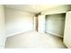 Bedroom featuring carpet, one window, and a closet at 111 Southern Estates Dr, Sanford, NC 27330
