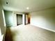 A spacious bedroom featuring carpet floors, neutral paint, and natural light at 111 Southern Estates Dr, Sanford, NC 27330