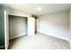 Bright bedroom features neutral carpeting, fresh paint, a walk-in closet and an adjacent room at 111 Southern Estates Dr, Sanford, NC 27330