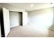 Bedroom features neutral carpeting, fresh paint, and a closet at 111 Southern Estates Dr, Sanford, NC 27330
