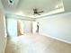 Expansive primary bedroom with recessed lighting, neutral paint, and an adjoining bathroom at 111 Southern Estates Dr, Sanford, NC 27330