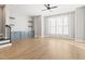 Bonus room with built-in shelving and hardwood floors at 1179 Cottonsprings Dr, Wendell, NC 27591