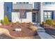 Townhouse front entrance with landscaping and walkway at 1179 Cottonsprings Dr, Wendell, NC 27591