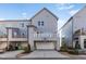 Townhouse rear with deck, garage, and basketball hoop at 1179 Cottonsprings Dr, Wendell, NC 27591