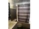 Bathroom featuring a sink and toilet, with a bathtub and shower with a striped curtain at 165 Wakeline Dr, Wendell, NC 27591