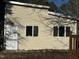 A charming, detached structure with two windows and a service door offers versatile space and potential at 165 Wakeline Dr, Wendell, NC 27591