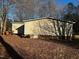 Side view of manufactured home showing exterior condition at 165 Wakeline Dr, Wendell, NC 27591