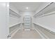 Walk-in closet with ample shelving and hanging space at 1819 Capstone Dr, Durham, NC 27713