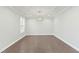 Elegant dining room with hardwood floors and neutral wall colors at 1819 Capstone Dr, Durham, NC 27713