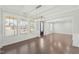 Bright dining room with hardwood floors and large windows at 1819 Capstone Dr, Durham, NC 27713